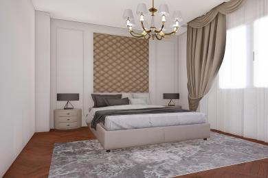 Alanya property bedroom featuring a tufted headboard, elegant chandelier, and soft, neutral tones creating a relaxing atmosphere.