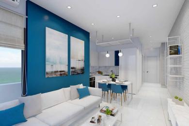 Lys leilighet i Alanya med havutsikt, med et moderne kjøkken, hvit sofa og blå detaljer.