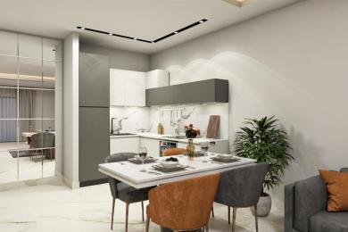 Alanya property featuring a modern kitchen and dining area with marble countertops and stylish, neutral-toned furniture under bright lighting.