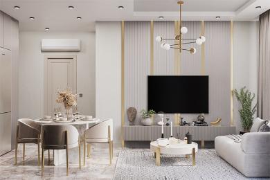 Alanya woning: Moderne woonkamer met marmeren tafel, zachte zitplaatsen en elegante gouden accenten die een serene sfeer creëren.