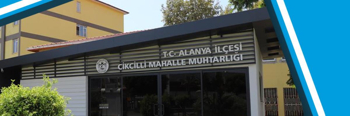 Birou în cartierul Cikcilli din Alanya, Turcia, oferind servicii locale și o atmosferă primitoare pentru turiști.